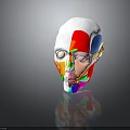 Colorful Human Head Model Showing Anatomical Facial Sections For Educational Use