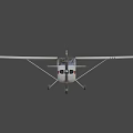 Small White Airplane With Red And Green Wing Markers On Gray Background