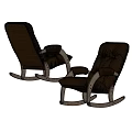 Two Brown Leather Rocking Chairs With Comfortable Padding And Wooden Rocking Legs