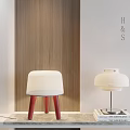 Modern Table Lamp With White Lampshade And Metal Stand On Tabletop With Stack Of Books