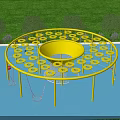 Yellow Circular Playground Equipment With Multiple Hoop Platforms On Blue Surface And Green Grass