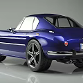 Blue Vintage Sports Car With Sleek Design Black Wheels And Chrome Details