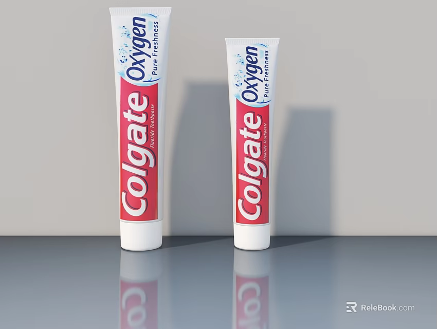 Colgate Oxygen Toothpaste Tubes With White Body Red Labels On Gray Countertop 3d model 