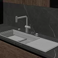 Stainless Steel Kitchen Sink With Modern Faucet On Sleek Marble Countertop