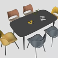 Modern Oval Black Dining Table Set With Six Brown Yellow Gray Chairs Fruit Bowl Magazine