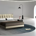 Modern Double Bed With Beige Upholstered Headboard Nightstand Floor Lamp Sea View Rug And Book On Rug
