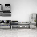 Stainless Steel Kitchen Appliances In Modern Design Featuring Range Hood Cooktop And Refrigerator