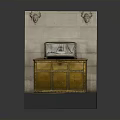 Classic Golden Furniture Cabinet On Stone Wall With Deer Head Decorations And Vintage Radio