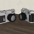 Vintage Digital Cameras With Classic Design Placed Side By Side On Wooden Table