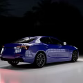 Blue Modern Sedan With Sleek Design Shiny Body And Black Wheels