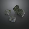 Three Natural Rockery Stones With Mossy Green Surface And Decorative Natural Appearance