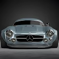 Vintage Modern Mercedes Sports Car With Light Blue Body Streamlined Design And Large Alloy Wheels