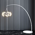 Modern Golden Arc Floor Lamp With Illuminated Ring Shades Against Dark Striped Wall