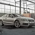 Silver Audi Sedan Parked In Industrial Space With Glass Roof And Metal Frames