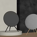 Modern Wireless Speakers With Dark Gray Light Gray Design And Black Gold Stands