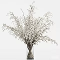 Elegant Floral Decoration With White Baby's Breath Bouquet In Clear Vase