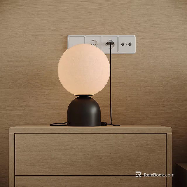 Modern Round Table Lamp With Beige Shade And Black Base On Wooden Nightstand 3d model 