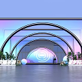Event Entrance Featuring Arched Structure Purple And Blue Gradient Lighting Green Plants And Decorative Balls