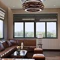 Modern Living Room Interior With Leather Sofa Coffee Table And Chandelier