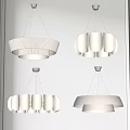 Modern Pendant Chandeliers with Contemporary White Shades and Illuminated Warm Glow in Interior Room Setting