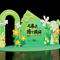 Spring Themed Decorative Display With Green Arch House Shaped Structure Rabbit Decor And Flowers