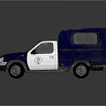 Blue And White Police Pickup Truck With Enclosed Cargo Cab And Emblem