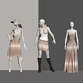 Three Fashion Mannequins in Stylish Beige Brown Outfits with Hat Scarf Black Boots Grey Walls