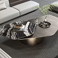 Modern Irregular Marble Coffee Table In Living Room With Sofa Decorative Tray And Green Plant