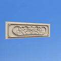 Intricate Carved Lotus Design On Decorative Stone Panel Against Blue Sky