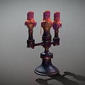 Three Candles On Dark Metal Candle Holder With Melted Wax Dripping