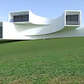 Modern White Building With Irregular Design On Green Grass And Blue Sky