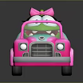 Green Cartoon Character With Pink Bow Riding In Colorful Convertible Toy Car