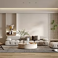Modern Living Room Interior With Beige Sofa Round Coffee Table And Plants