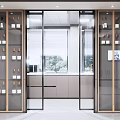 Modern Wine Cabinet With Glass Doors And Wooden Frame Displaying Wine Bottles And Glasses