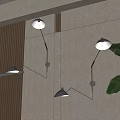 Modern Sleek Wall Lamps Mounted On Neutral Wall With Metal Arm And Green Leaves