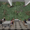 Greenery Filled Restaurant Interior With Living Plant Wall Red Flowers And Dining Tables