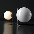 Modern Table Lamp Pair With Spherical Shade Metal Base And Illuminated Unlit Design