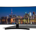 Curved Computer Monitor Showing City Skyline Night View With Water Reflection And Sleek Design