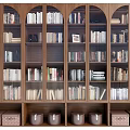 Wooden Bookcase Interior With Arched Doors And Multi tiered Shelves Full Of Books