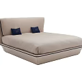 Modern Beige Upholstered Double Bed With Contoured Headboard And Dark Blue Pillows 3d model