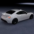 Silver Sports Car Two Door Coupe With Sleek Aerodynamic Body And Black Alloy Wheels