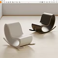 Modern White And Black Rocking Chairs With Minimalist Design On Light Wooden Floor