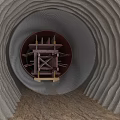 Tunnel Construction Site With Circular Boring Equipment And Concrete Tunnel Walls