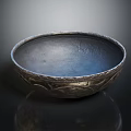 Elegant Vintage Metal Bowl With Intricate Carved Patterns And Blueish Interior Design
