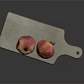 Gray Wooden Cutting Board With Two Fresh Ripe Pomegranates On Top