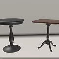 Two Round Tables With Different Designs Black Brown Tops And Unique Bases For Home Decor