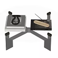 Modern Glass Top Coffee Table With Metal Frame And Remote Control On Surface
