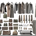 Stylish Neutral Tones Clothes Hanging With Matching Bags Shoes Scarves And Luggage