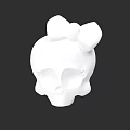 White Skull Sculpture With Decorative Bow On Black Background
