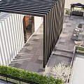 Rooftop Garden Outdoor Living Space With Pink Flowering Tree Blue Pergola And Patio Furniture